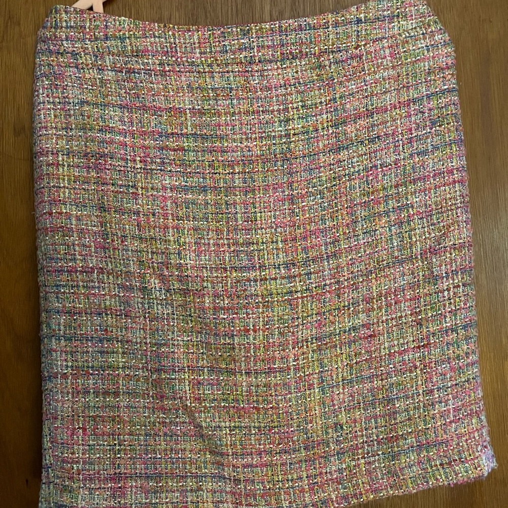Pink tweed above the knee pencil skirt.